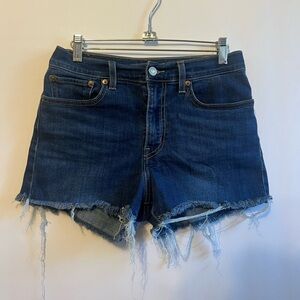 Levi’s High Rise Denim Shorts size 27 with distressed hem